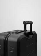Db Ramverk Check-In Luggage Large Black Out 